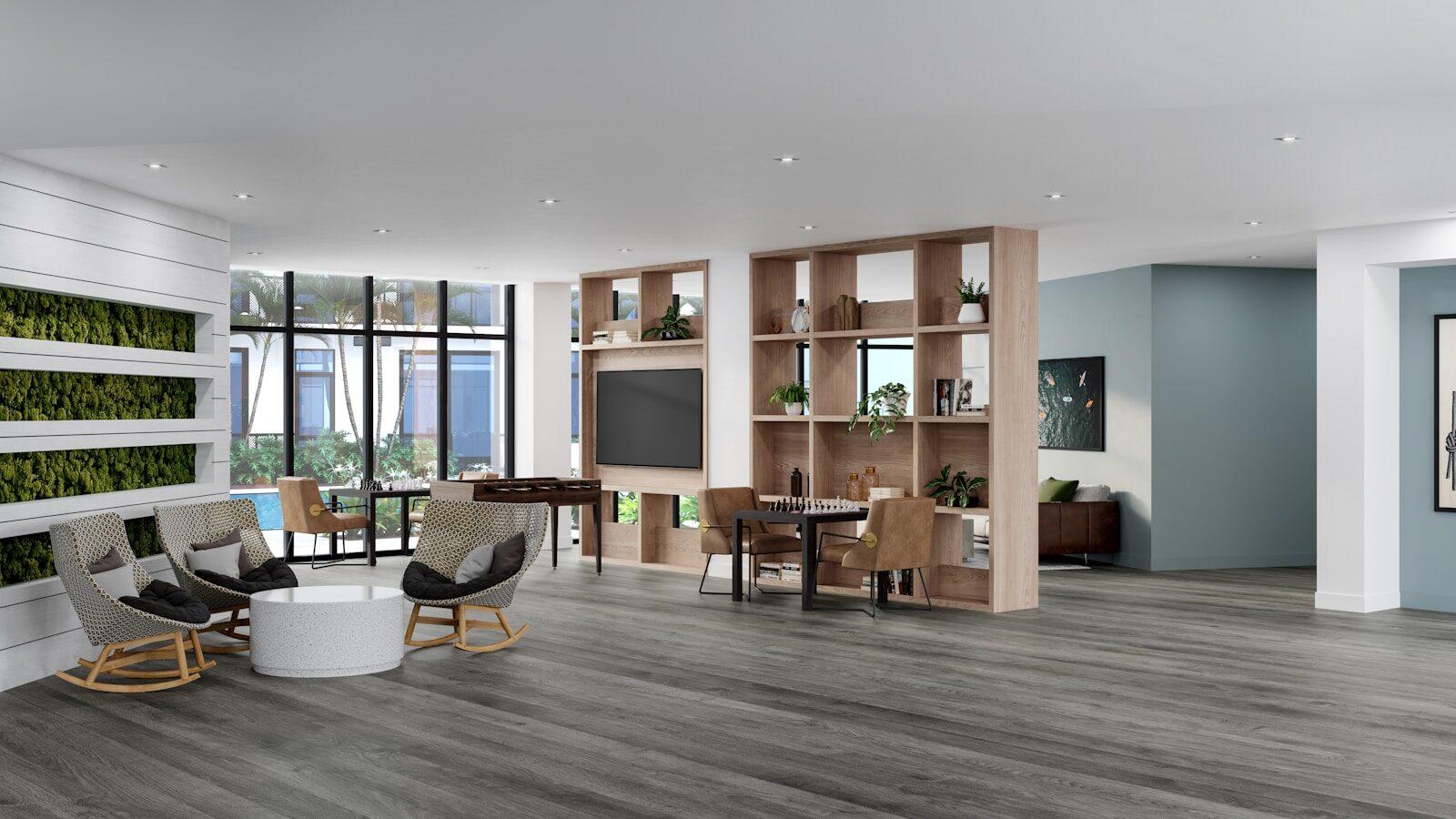 a living room filled with furniture and a large window