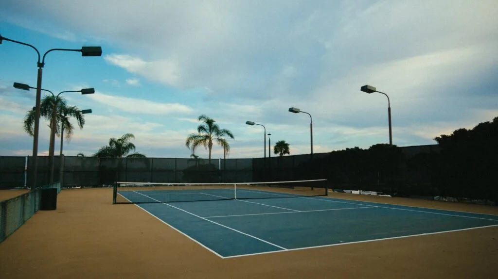 blue tennis court paid with HOA dues