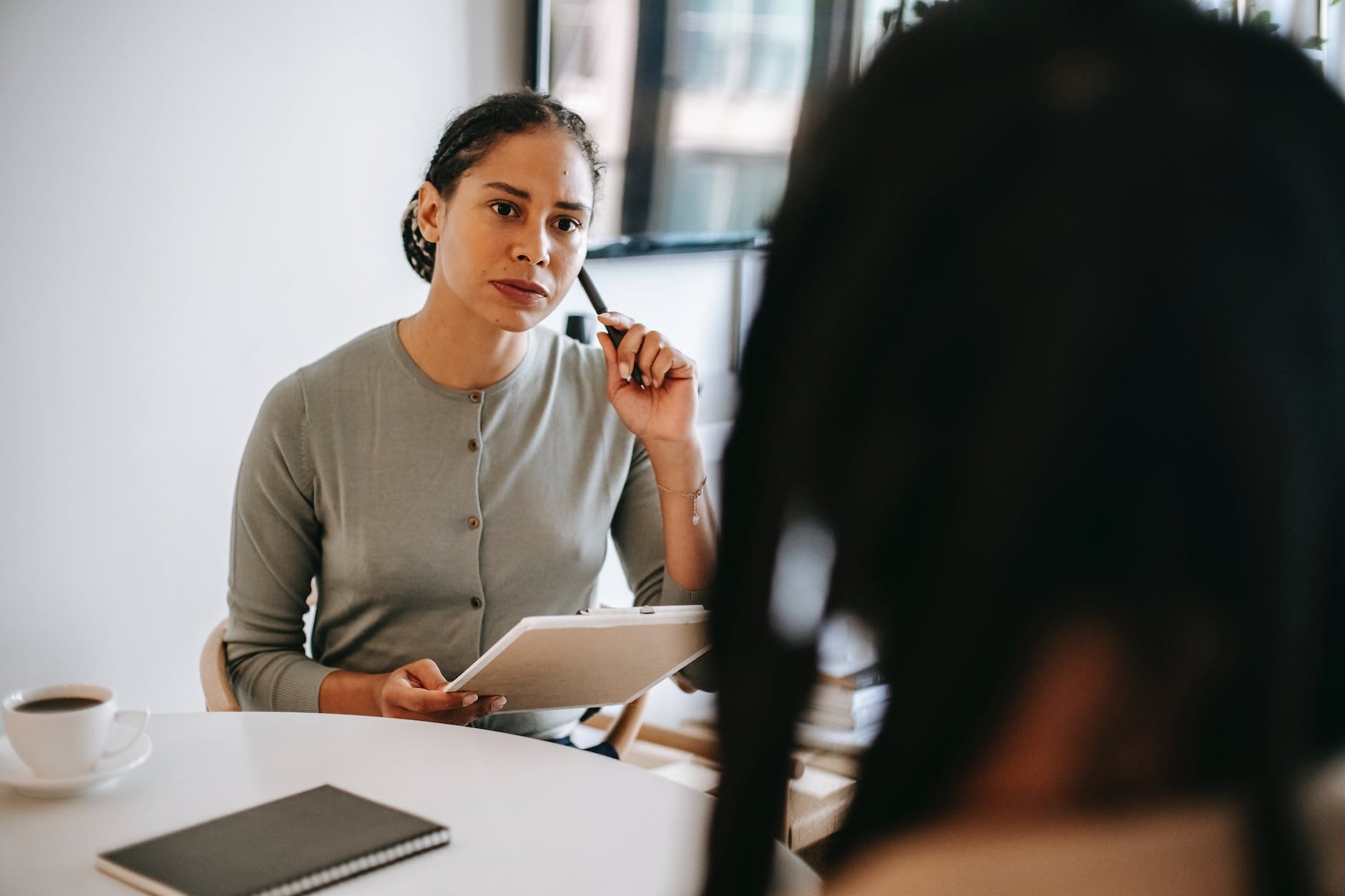 serious ethnic psychotherapist listening to clients complains Owner Questions About Property Management