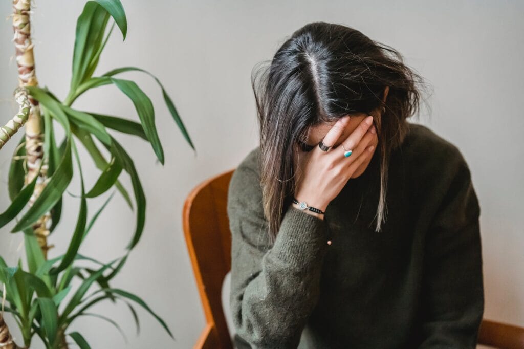 worried young woman common mistakes landlords make during tenant turnover