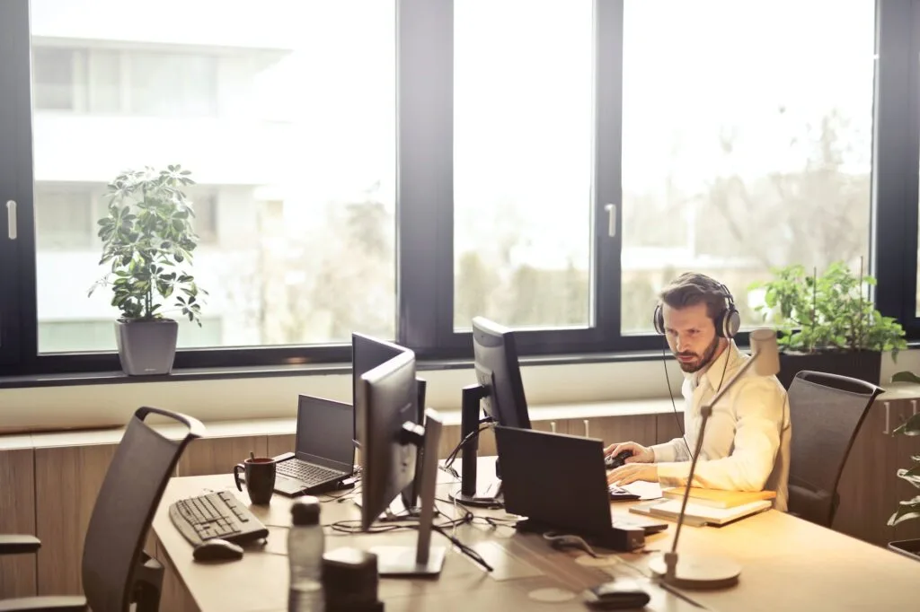 Property Manager in Land O' Lakes facing computer monitor